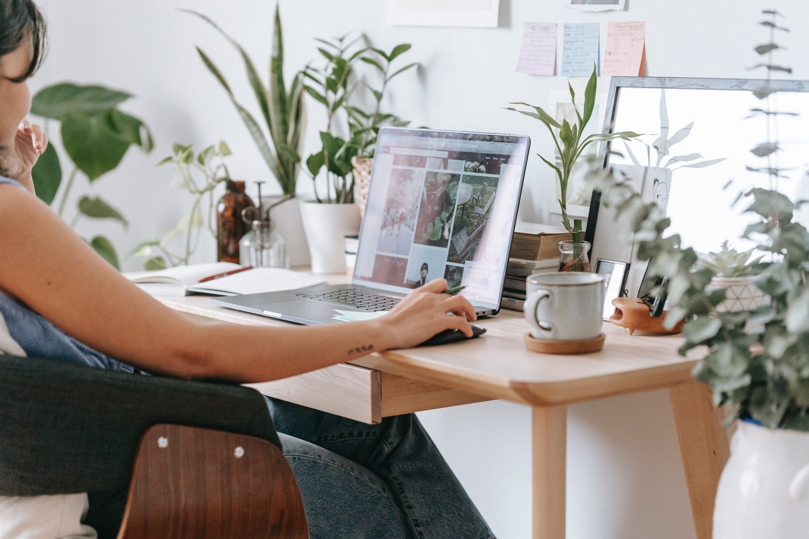 Professional working at a laptop in a home office