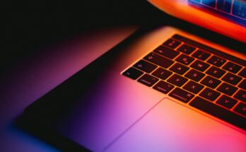 Colorful light across a laptop keyboard