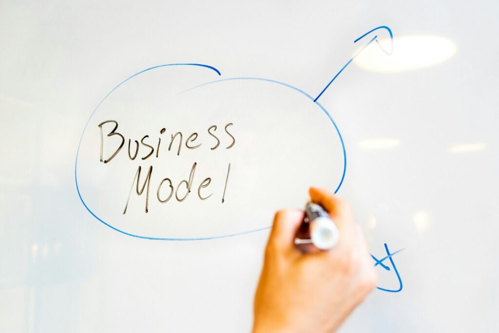 Writing a business model in a notebook
