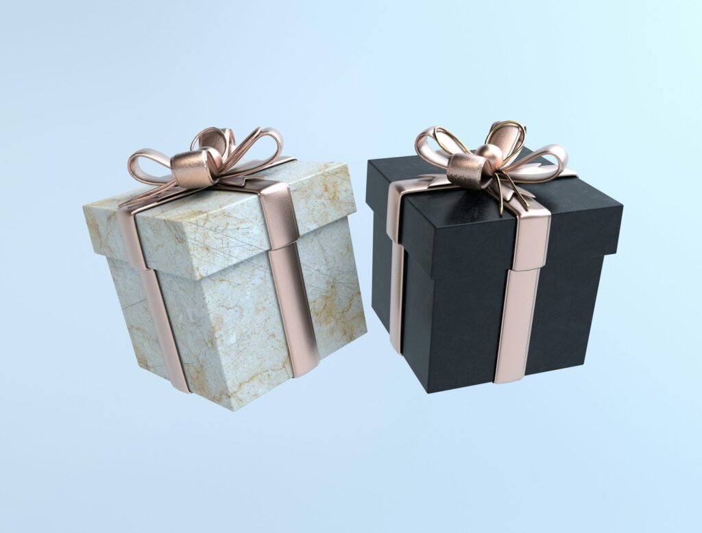 Two gift boxes with decorative bows