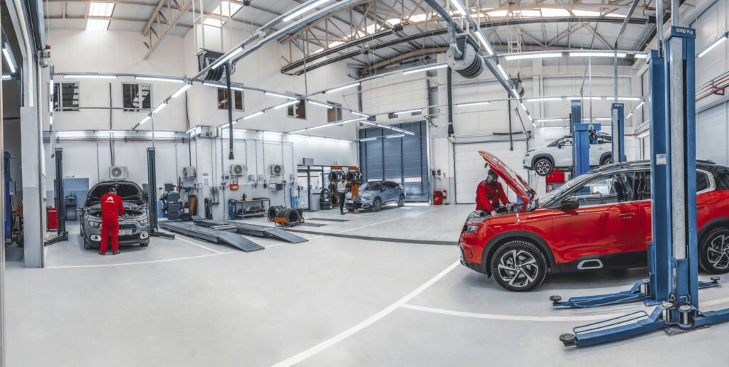 Vehicles in an automotive repair workshop